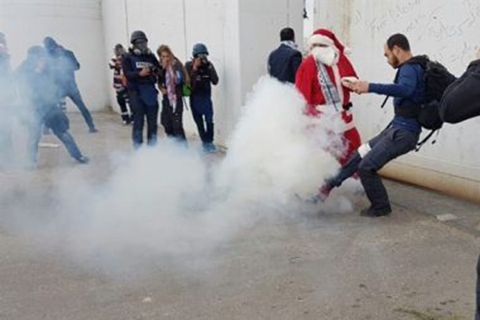 Israeli Forces Violently Subdue Holiday Santa Claus March
