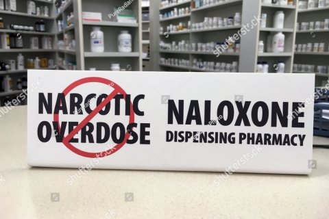 480_stock-photo-naloxone-pharmacy-sign-on-counter-showing-the-pharmacy-now-sells-over-the-counter-naloxone-544557994.jpg