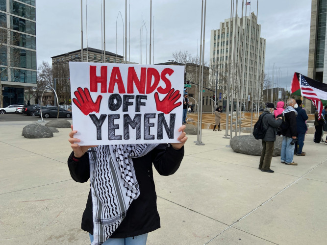 sm_yemen_hands_off_sign.jpg 