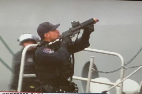 SF Cop With Weapon  Aimed At Harvey Milk Ship Boarders