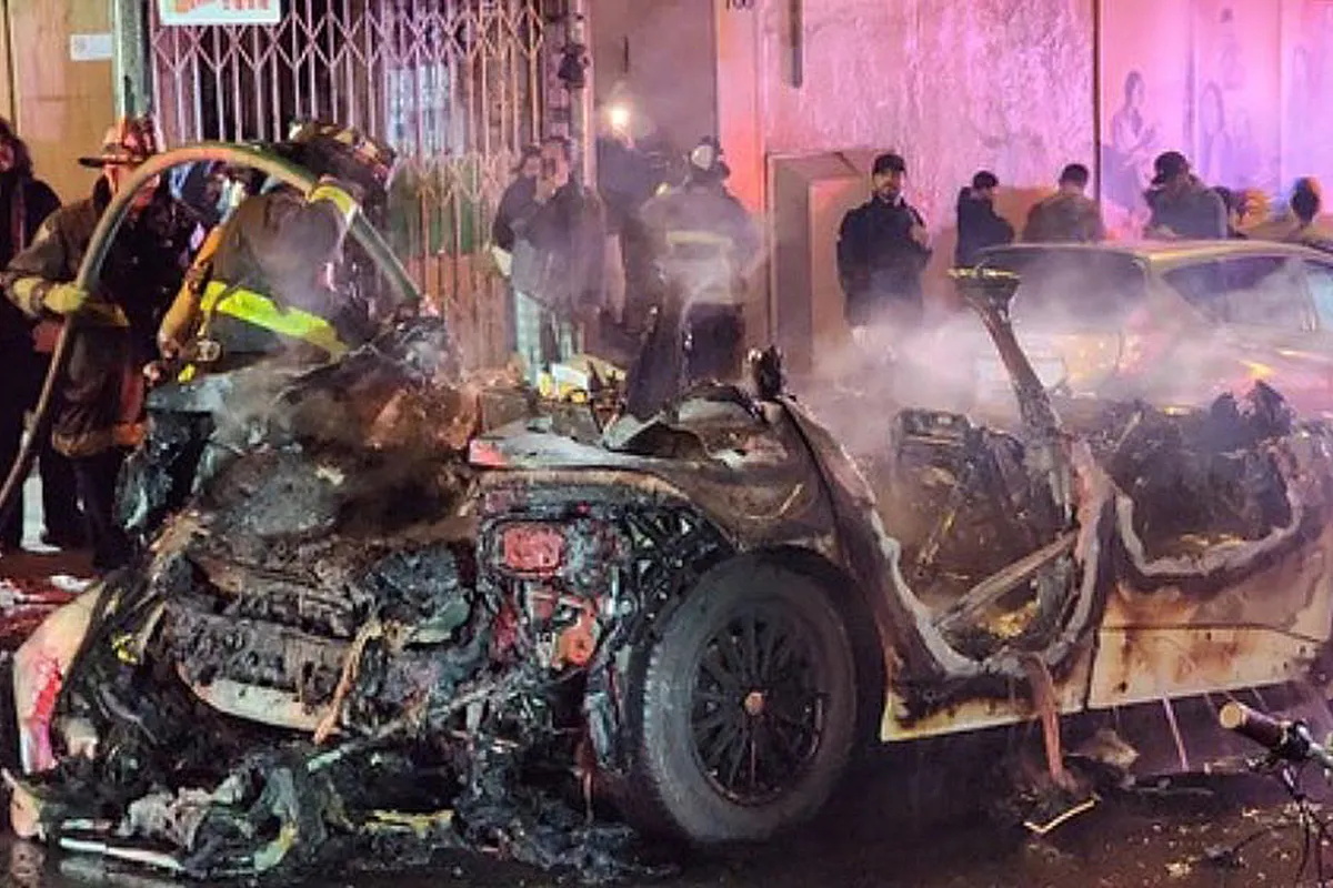 A Waymo robo taxi was burned up when it stopped in the middle of Chinatown due to the sound of fireworks
