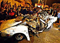 Car of Hamas leader, al-Rantissi, blown up by Israeli assassins.