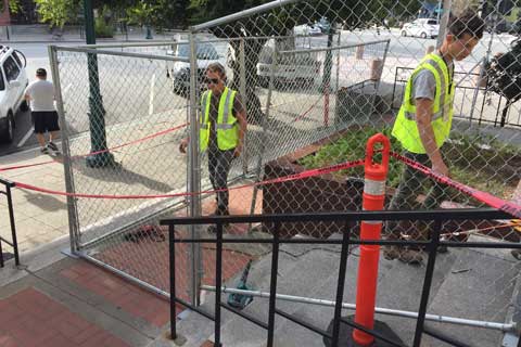 Community Members Decorate Anti-Homeless Fence at Santa Cruz Post Office